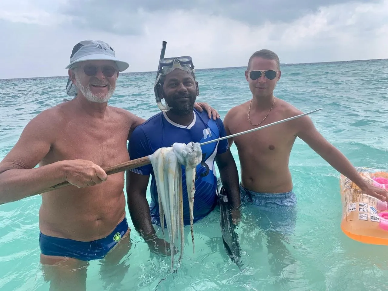 Local guide on the Maldivian ocean at golden hour
